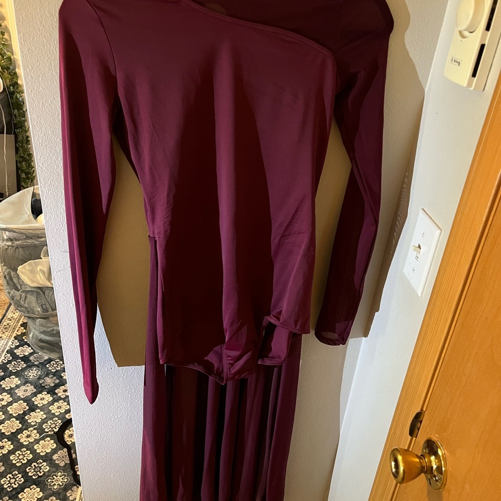 ADULT SMALL dance costume Burgandy with a long sheer end at the back.